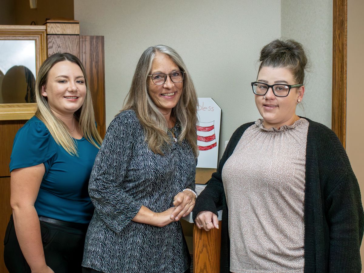 Members of the Hermitage branch team in the lobby