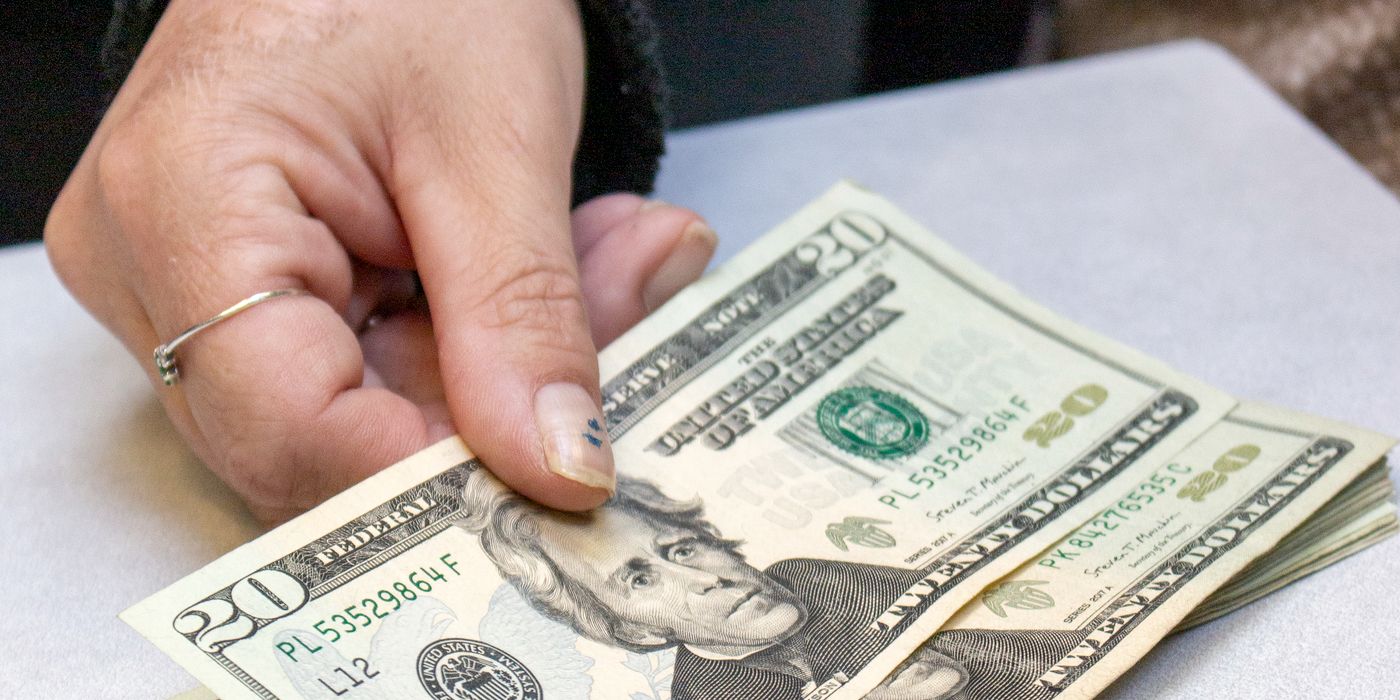 Counting out cash at the counter
