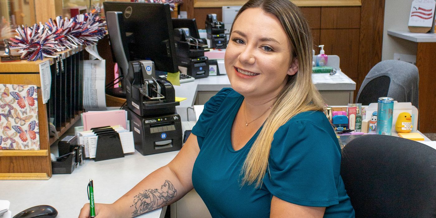 A Hermitage branch employee at her workstation